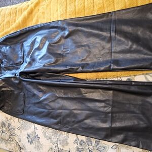 Black Pleather Pants Not Real Leather.  Did Not Fit Me.
